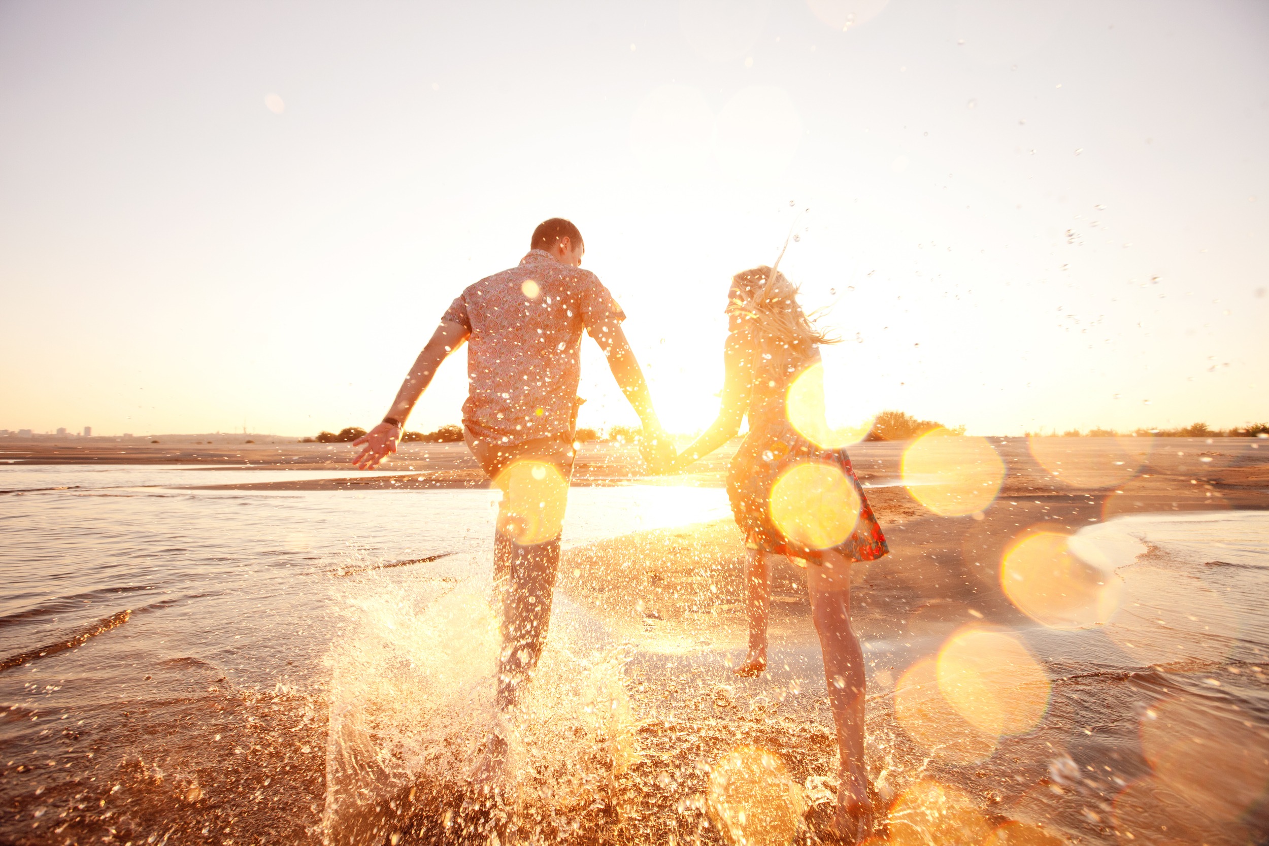 Couple Playing in Beach